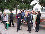 увеличить